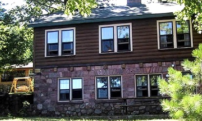 Rustic Two-Story Cabin Rental with Lake Access in Hayward, Wisconsin - glamping.directory