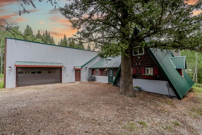 Charming Wooded Cabin with Fire Pit & Bunkhouse Near Yellowstone, Island Park, ID - glamping.directory