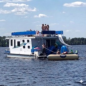 Versatile Sportsman Houseboat with Wraparound Fishing Deck & Water Slide Near Babbitt, MN - Babbitt, Minnesota - glamping.directory