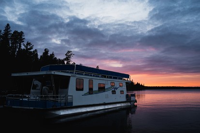 Versatile Sportsman Houseboat with Wraparound Fishing Deck & Water Slide Near Babbitt, MN - Babbitt, Minnesota - glamping.directory