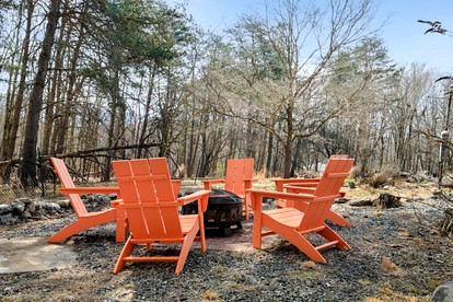 Extraordinary Group Retreat with Hot Tub, Fire Pit, Wraparound Deck in Great Cacapon, WV - Great Cacapon, West Virginia - glamping.directory