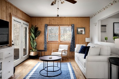 Extraordinary Group Retreat with Hot Tub, Fire Pit, Wraparound Deck in Great Cacapon, WV - Great Cacapon, West Virginia - glamping.directory