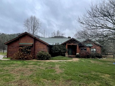 Charming, Pet-Friendly Cabin with Private Lake and Hot Tub, for Unforgettable Retreats to Nature in Tellico Plains - glamping.directory