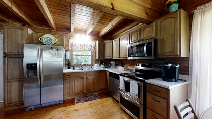Elevate Your Tennessee Glamping Escape in this Lovely Riverside Cabin Rental in Newport - Newport, Tennessee - glamping.directory