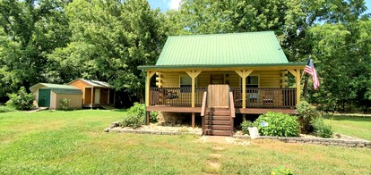 Elevate Your Tennessee Glamping Escape in this Lovely Riverside Cabin Rental in Newport - glamping.directory