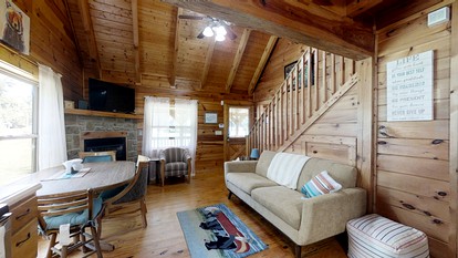 Elevate Your Tennessee Glamping Escape in this Lovely Riverside Cabin Rental in Newport - Newport, Tennessee - glamping.directory