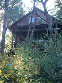 Rustic Two-Bedroom Cabin Rental on Hamilton Creek in Texas Hill Country - glamping.directory