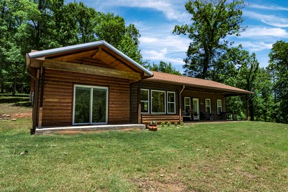 Enchanting Riverside Cabin Retreat with Mountain Views near Sardis Lake Oklahoma - glamping.directory