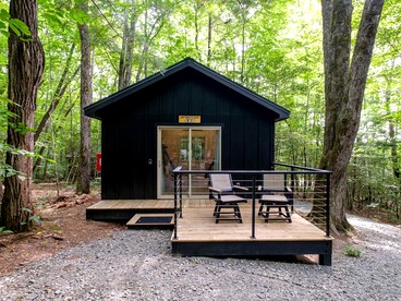 Secluded Forest Paradise: Cozy Cabin on 150 Acres in Transylvania County, NC - glamping.directory