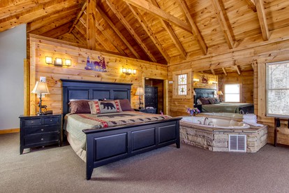 Breathtaking Cabin with Hot-Tub, Foosball Table and Outdoor Pool in Pigeon Forge, Tennessee - Pigeon Forge, Tennessee - glamping.directory