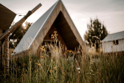 Adventure-Ready A-Frame Cabins with Fire Pit & Cozy Mountain Setting in Emigrant, Montana - glamping.directory