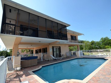 Incredible Beach Cottage Rental with Heated Swimming Pool in Islamorada, Florida - Islamorada, Florida - glamping.directory