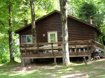 Secluded Lakeside Log Cabin Ideal for Couples Getaway' in Hayward, Wisconsin - glamping.directory