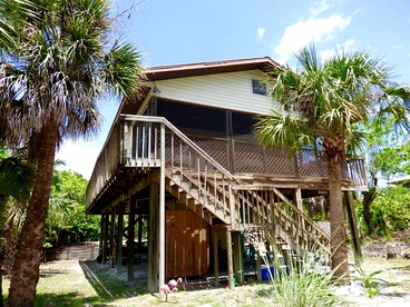 Serene Island Cottage with Screened Porch near Little Gasparilla Beach, Florida - glamping.directory