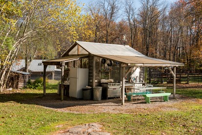 Gorgeous Fully Restored Caravan Nestled in the Trees Along Silver Lake for a Unique Vacation in Woodridge, New York - glamping.directory