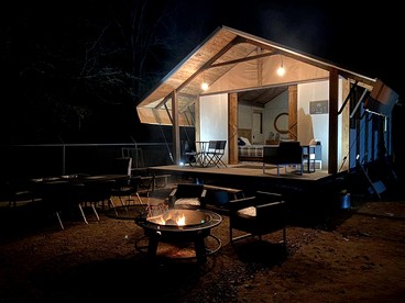 Beautiful Lakefront Glamping Cabin with Fire Pit and Lake Views near Austin, Texas - glamping.directory