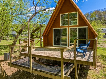 Creekside A-Frame Retreat with Treehouse Views, Hammock Lounge & Indoor-Outdoor Shower in New Port, Tennessee - glamping.directory