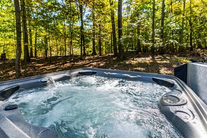 Bright and Spacious Cabin with Hot Tub, Fire Pit, and Grill Perfect for Your Hedgesville, WV Getaway - Hedgesville, West Virginia - glamping.directory