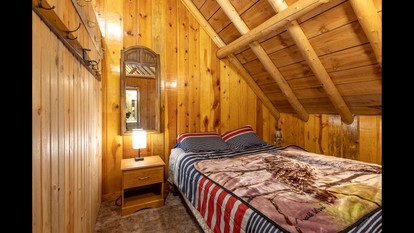 Rustic Cabin Retreat with Private Pond & Hot Tub near Island Park, Idaho - Island Park, Idaho - glamping.directory