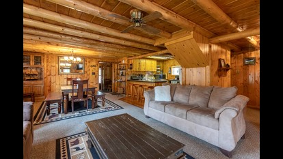 Rustic Cabin Retreat with Private Pond & Hot Tub near Island Park, Idaho - Island Park, Idaho - glamping.directory