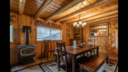 Rustic Cabin Retreat with Private Pond & Hot Tub near Island Park, Idaho - Island Park, Idaho - glamping.directory