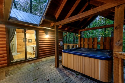 Romantic Cabin for Two with Hot Tub, Fireplace & Double Shower Near Hochatown - Broken Bow, Oklahoma - glamping.directory