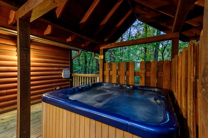 Romantic Cabin for Two with Hot Tub, Fireplace & Double Shower Near Hochatown - Broken Bow, Oklahoma - glamping.directory