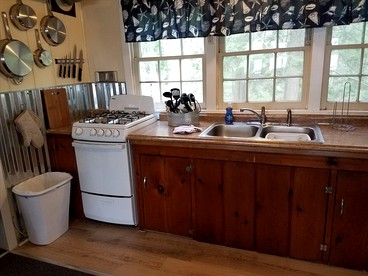 Charming Vacation Cabin with Waterfront Views on Pine Lake, Michigan - Wellston, Michigan - glamping.directory