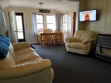 Charming Vacation Cabin with Waterfront Views on Pine Lake, Michigan - Wellston, Michigan - glamping.directory