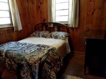 Charming Vacation Cabin with Waterfront Views on Pine Lake, Michigan - Wellston, Michigan - glamping.directory