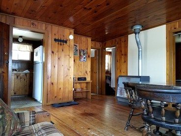 Charming Vacation Cabin with Waterfront Views on Pine Lake, Michigan - Wellston, Michigan - glamping.directory