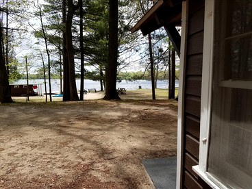 Charming Vacation Cabin with Waterfront Views on Pine Lake, Michigan - Wellston, Michigan - glamping.directory