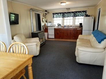 Charming Vacation Cabin with Waterfront Views on Pine Lake, Michigan - Wellston, Michigan - glamping.directory