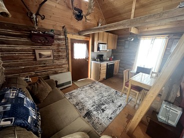 Charming Log Cabin with Mountain Views near Trails in Pony, Montana - Pony, Montana - glamping.directory