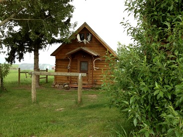 Charming Log Cabin with Mountain Views near Trails in Pony, Montana - Pony, Montana - glamping.directory