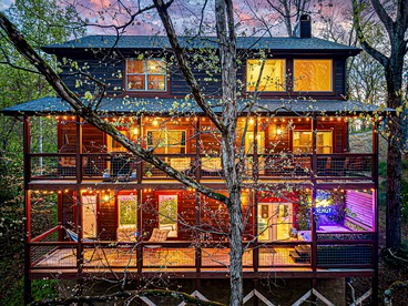 Luxurious Dolly Parton Inspired Cabin with Indoor Pool, a Private Hot Tub, and Arcade Games near Dollywood, Tennessee - Sevierville, Tennessee - glamping.directory