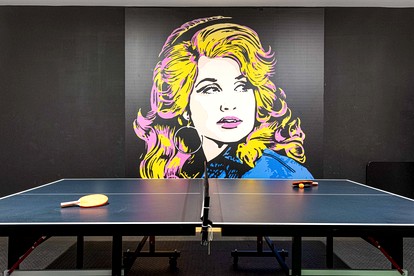 Luxurious Dolly Parton Inspired Cabin with Indoor Pool, a Private Hot Tub, and Arcade Games near Dollywood, Tennessee - Sevierville, Tennessee - glamping.directory