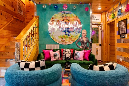 Luxurious Dolly Parton Inspired Cabin with Indoor Pool, a Private Hot Tub, and Arcade Games near Dollywood, Tennessee - Sevierville, Tennessee - glamping.directory