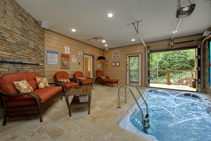 Fun-Filled Sevierville Cabin with a Pool and Mini-Golf for Family Getaways in Tennessee - Sevierville, Tennessee - glamping.directory