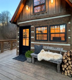 Secluded Woodland Cabin with Relaxing Outdoor Space in Weaverville, North Carolina - glamping.directory