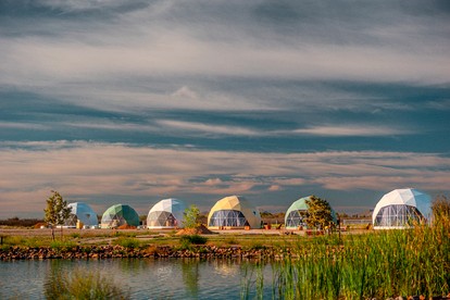 Luminous Cozy Dome with a Barbie Collection Above Bed in Willcox, Arizona - Wilcox, Arizona - glamping.directory