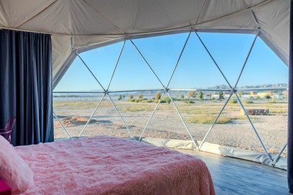 Luminous Cozy Dome with a Barbie Collection Above Bed in Willcox, Arizona - Wilcox, Arizona - glamping.directory