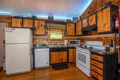 Cozy Cabin with Barbecue Perfect for a Romantic Getaway in Pigeon Forge, Tennessee - Pigeon Forge, Tennessee - glamping.directory