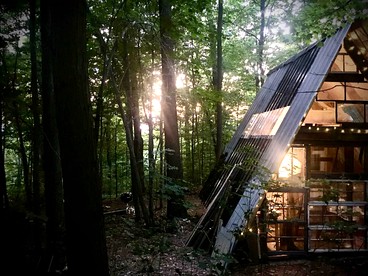 Rustic Upcycled Cabin with a Wood Stove Perfect for Central New York Camping - glamping.directory