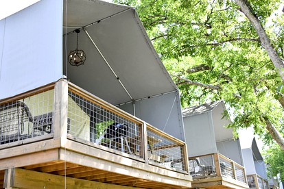 Texas Waterside Escape: Glamping Holiday in a Tented Cabin with Shared Comforts - Cibolo, Texas - glamping.directory