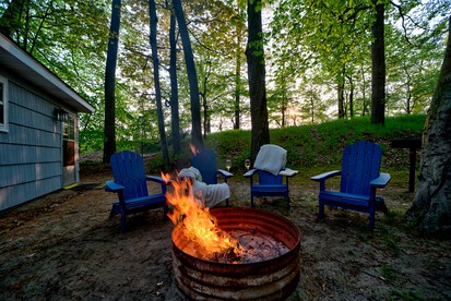 Lake Michigan Retreats in this Charming Cabin Rental with Fire-Pit - Muskegon, Michigan - glamping.directory