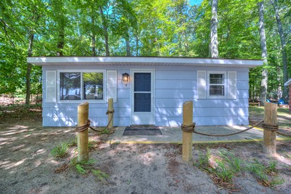 Lake Michigan Retreats in this Charming Cabin Rental with Fire-Pit - glamping.directory