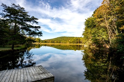 Peaceful Chalet-Cabin with a Private Lake, Hot Tub, Fire Pit and Deck at this Berkeley Springs, WV Getaway - Berkeley Springs , West Virginia - glamping.directory