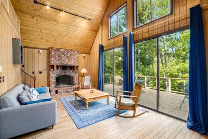 Peaceful Chalet-Cabin with a Private Lake, Hot Tub, Fire Pit and Deck at this Berkeley Springs, WV Getaway - Berkeley Springs , West Virginia - glamping.directory