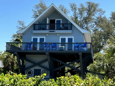 Family-Friendly Beach House with Dock & Kayaks on Secluded Little Gasparilla Island near Boca Grande, Florida - glamping.directory